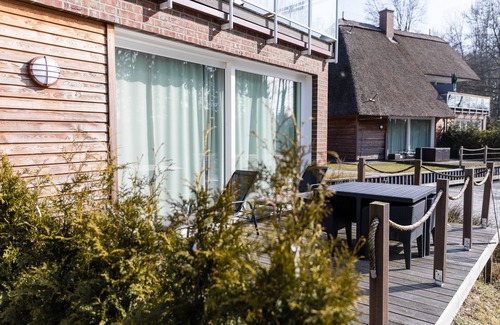 Bad Zwischenahn Apartment | SmartFewo: Segel setzen | lake terrace | sauna