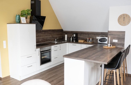 Bad Zwischenahn Apartment | SmartFewo: Wellenreiter | Penthouse | Sauna | Park