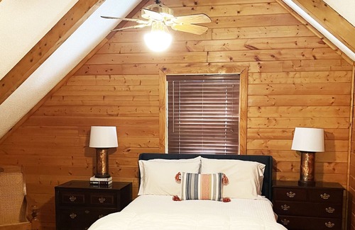 Houston House | Smith Lake Getaway: Lake front, custom log home with private dock and swim deck.