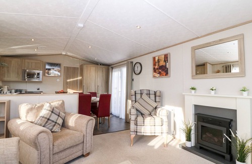St George Cottage | SNAPE LODGE, pet friendly, with pool in Towyn