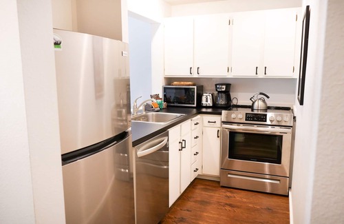 Glacier Condo | Snowater Resort Condo with Fireplace, Pool, amenities and River access