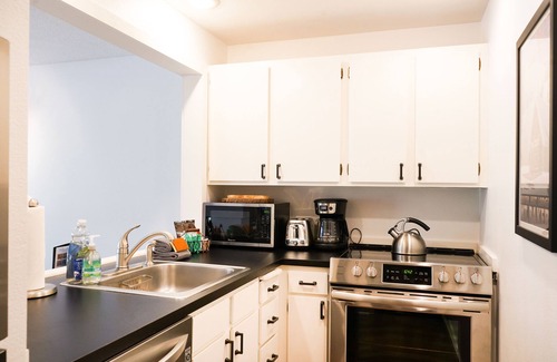 Glacier Condo | Snowater Resort Condo with Fireplace, Pool, amenities and River access