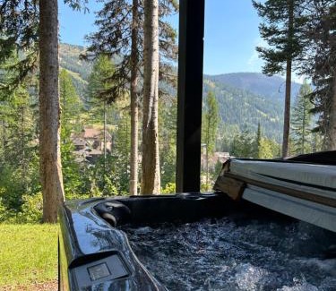 Whitefish House | Snowghost Den True Ski In Ski Out Home Sleeps 9 with 3 Bedrooms 2 and a half Bathrooms and Private Hot Tub