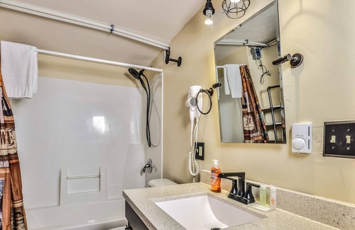 Conover Cabin | Snowmobiler's sanctuary with easy trail access, updated interior, & washer/dryer