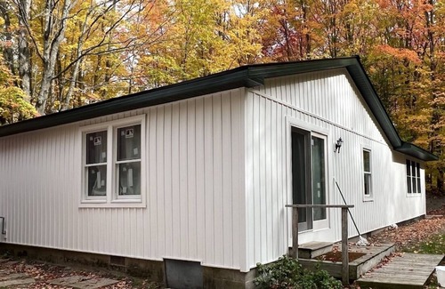 Petoskey House | SNOWMOBILERS PARADISE! Trail access from front door! Up North Quiet Getaway!