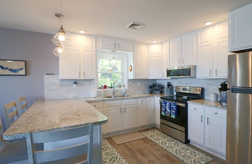 Jamestown Apartment | Soak in the expansive views and enjoy lakefront at Willow Avenue! *Hot Tub*