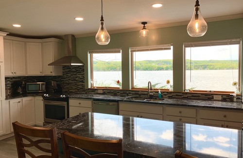 Bradford House | Soak in the sunset and celebrate the beauty of any season on the lake!