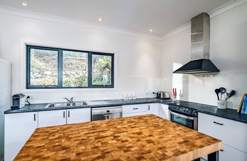 Bostobrick House | Soar Above the Dorrigo Plateau in a Mountain Retreat in 300 acres of Rainforest!