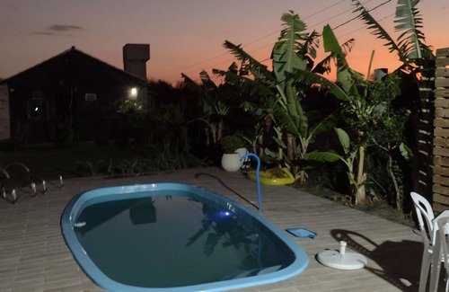 Passo de Torres House | Sobrado a Beira do rio Manpituba com Piscima Quiosques com Churrasqueira