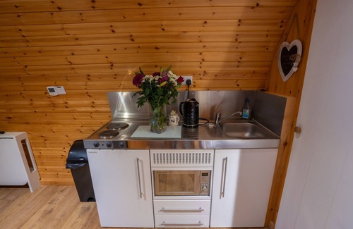 East Huntspill Apartment | Somerset glamping pod with access to adventure activities.