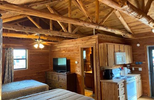 Prairie Lea House | Son's Blue River Camp LogCabin3 - Romantic Log Cabin on the River with view!