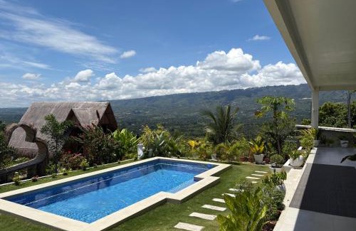 Badian House | Sondela Lambug Room1 pool mountain view