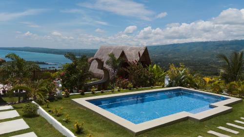 Badian House | Sondela Lambug Room1 pool mountain view