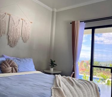 Badian House | Sondela Lambug Room1 pool mountain view