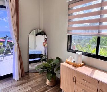 Badian House | Sondela Lambug Room1 pool mountain view