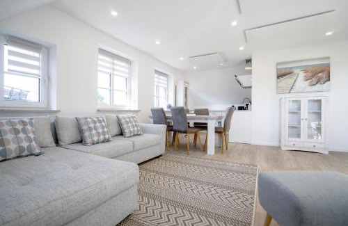 Suederhafen Apartment | Sonnenglück - Helle und moderne Ferienwohnung am Meer