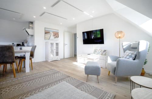 Suederhafen Apartment | Sonnenglück - Helle und moderne Ferienwohnung am Meer