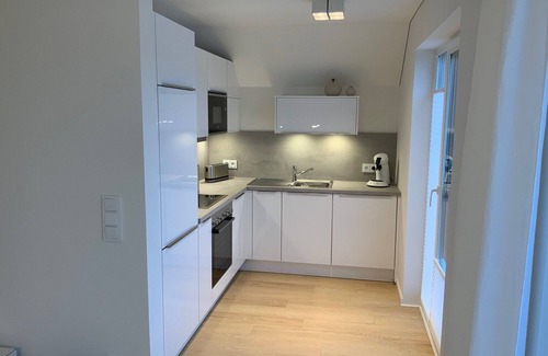 Olpenitz Apartment | Sonnenschein - Kaminofen, Süd-balkon, Dusche, Infrarotsauna, Stellplatz, E-lades