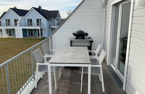 Olpenitz Apartment | Sonnenschein - Kaminofen, Süd-balkon, Dusche, Infrarotsauna, Stellplatz, E-lades