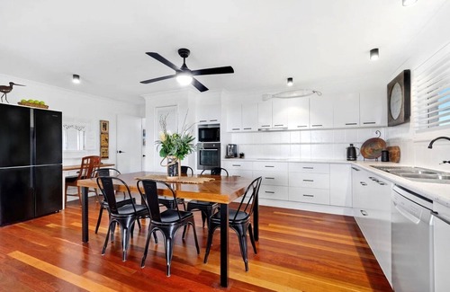 Burnett Heads House | Soothed by the sights and sounds of the sea, the Quirky Black Shack beckons!