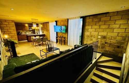 Downtown Guadalajara Apartment | Sophisticated Loft w/Gym & Dedicated Coworking Zone | 2 BD | Tribu Colón (304)