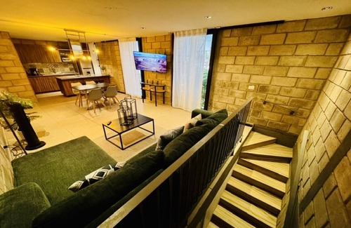 Downtown Guadalajara Apartment | Sophisticated Loft w/Gym & Dedicated Coworking Zone | 2 BD | Tribu Colón (304)
