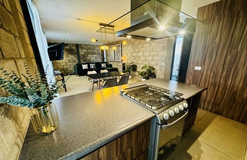 Downtown Guadalajara Apartment | Sophisticated Loft w/Gym & Dedicated Coworking Zone | 2 BD | Tribu Colón (304)