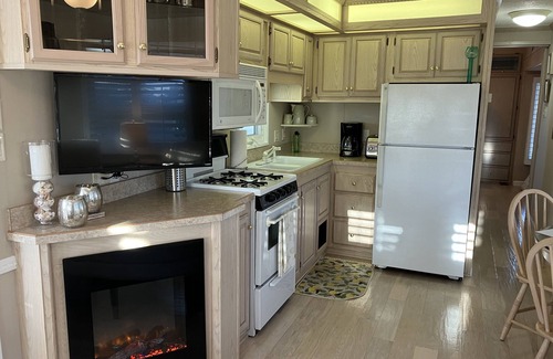 Sandbridge Cottage | Sophisticated waterfront Sandbridge cottage on Back Bay, minutes to the ocean.