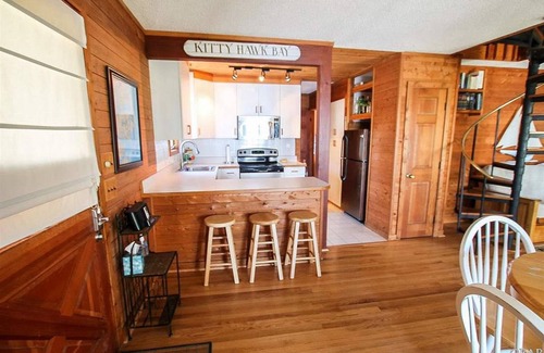 Colington Harbour Cottage | Soundfront Beach House with Kayaks, Sailboat & lots of Beach Toys!