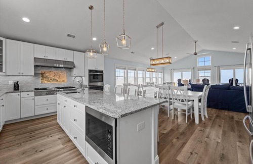 Avon House | Soundfront home, shallow water, private pool, hot tub, windsurfing access ★