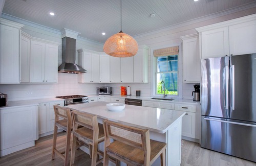 Lubbers Quarters Cay House | South End Villa on the water: lovely pool, expansive decks, and 60’ private dock