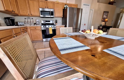 Orange Tree Villa | South facing four bedroom home, solar heated private pool, spa and games room.