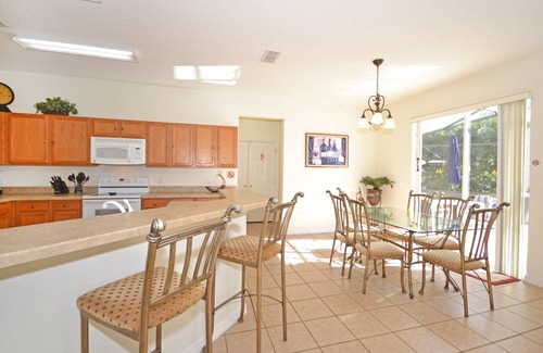 Windwood Bay House | South Facing Pool Home With Large Secluded Deck