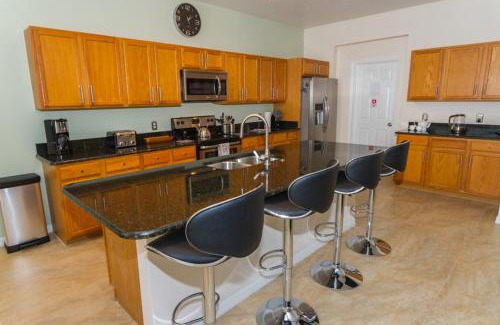 Windwood Bay House | South Facing Pool & Spa - Fenced Yard - Game Room - Family Friendly - Near Disney