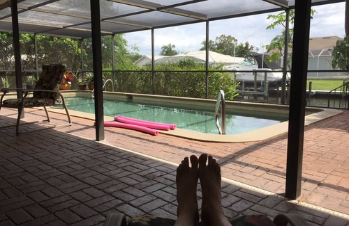 Caloosahatchee House | Southfacing Sunrise/Sunset Pristine Canal, Screened Pool, Lanai, Hot Tub!