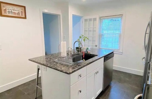 Southport House | Southport Shoreline Charm: Elegant Coastal Escape