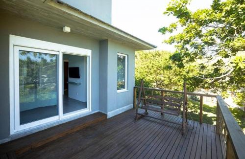 Garopaba House | Spa Jacuzzi, Lareira, Beira mar, 4 Suítes