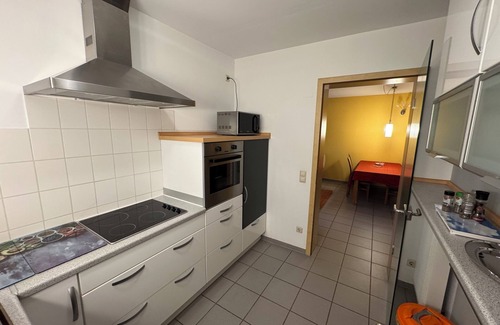 Herxheim Apartment | Spacious vacation apartment with a beautiful covered terrace in a huge garden.