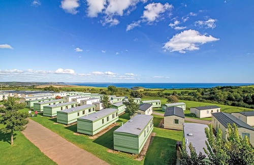 Looe House | Spacious 12ft-wide caravan with one double and two twin.
