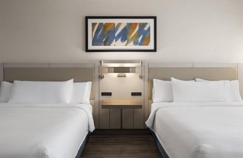 Albuquerque Hotel | Spacious 2 Queen Suites | Pool, Dining, & Bar Area