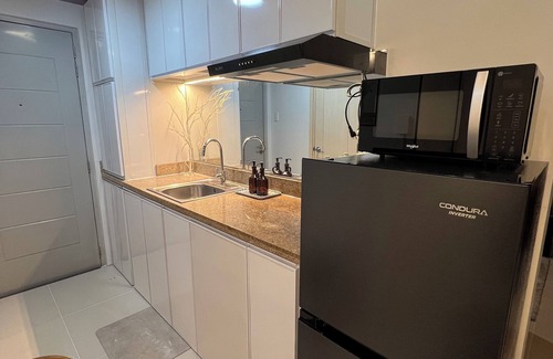 Santo Cristo Condo | Spacious 2BR Condo | Sleeps 6 | Walk to SM North EDSA | Great City Views