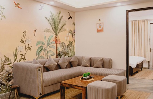 Chhatarpur Apartment | Spacious 3-bedroom apartment in vibrant New Delhi with WiFi, AC