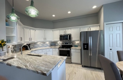 Tropical Cove Condo | Spacious 3 BR, 2 bath condo in Gated Golf Community, private pool, near beaches.