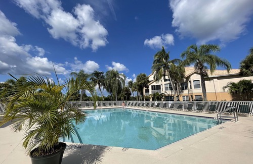 Tropical Cove Condo | Spacious 3 BR, 2 bath condo in Gated Golf Community, private pool, near beaches.