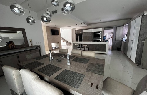 Delicias House | Spacious 4-bedroom house with WiFi, Pool, fitness room in welcoming Delicias