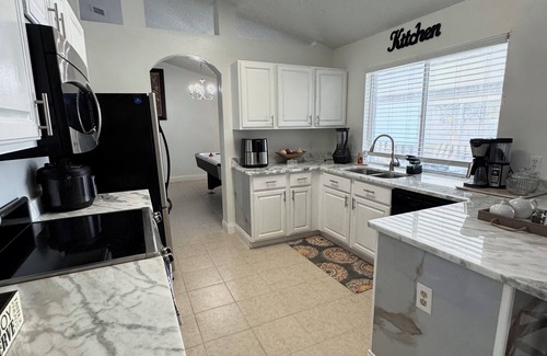 Deltona Lakes House | Spacious 4-bedroom house in serene Deltona with AC, WiFi