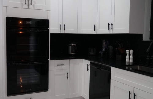 Golden Glades House | Spacious 4-bedroom house in Miami with Hot Tub, Lake, Kayaks, and Pool table