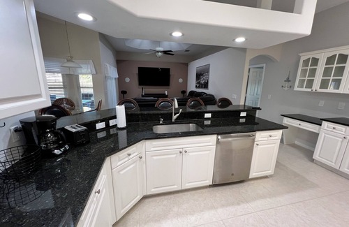 Vero Beach South House | Spacious 4-bedroom pool house with WiFi and AC in charming Vero Beach