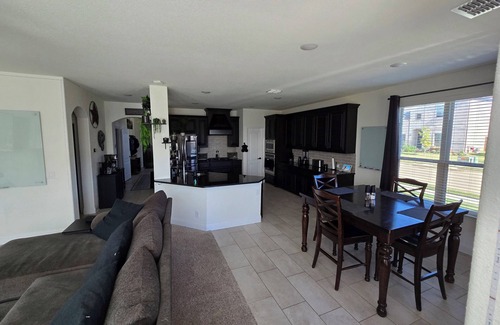 Argyle House | Spacious 4-bedroom Smart Home in Argyle with AC/Heat, small gym, and TVs galore