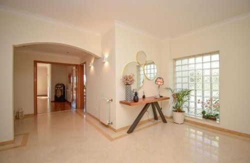 Linho Villa | Spacious 4-Bedroom Villa with Private Heated Pool in Quinta da Beloura Sintra Ideal for Families & Long Stays